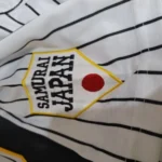 Custom Black and Gold Baseball Jersey photo review