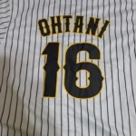 Custom Black and Gold Baseball Jersey photo review